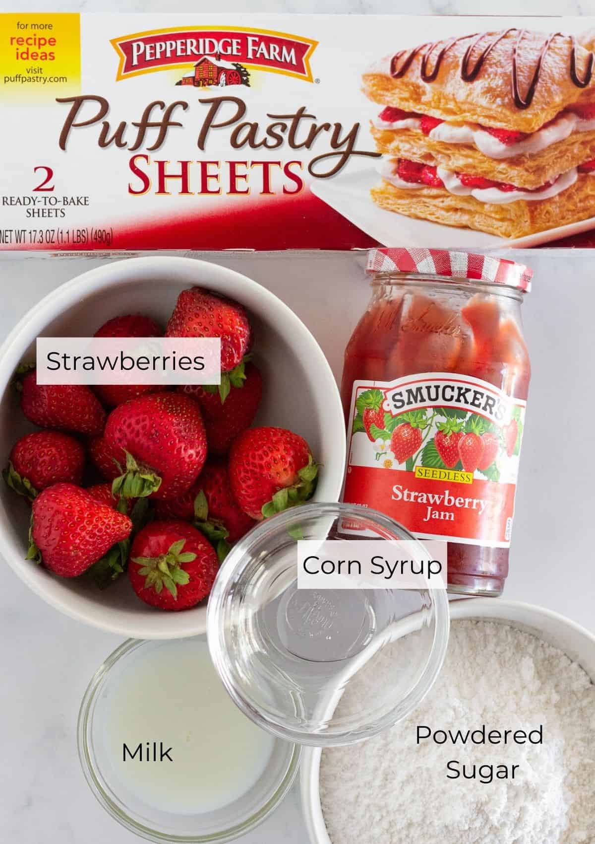 The ingredients needed to make strawberry turnovers.