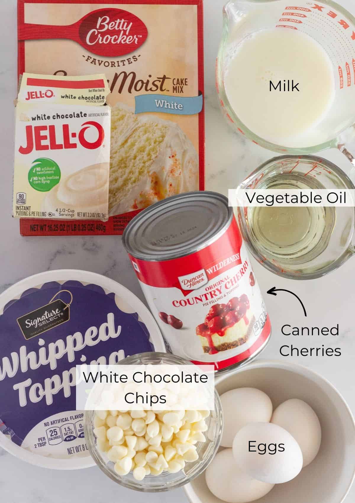 The ingredients needed to make a white forest cake.