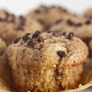 A Nutella swirled muffin with the wrapper off and ready to eat.