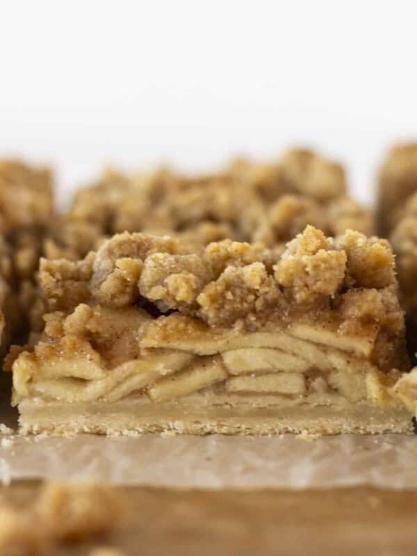 Dutch apple pie bars that have just been cut into squares.