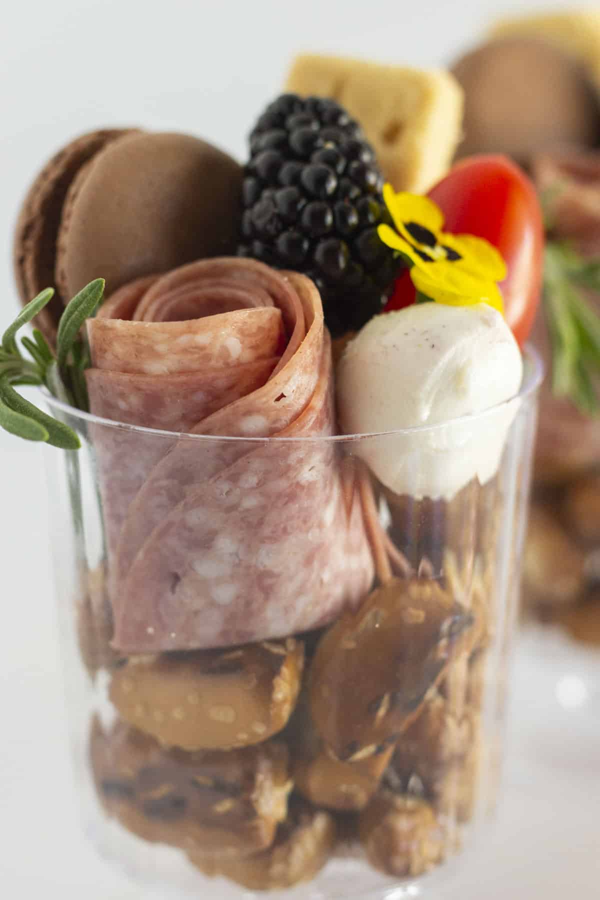 A close up of easy to make charcuterie cups.