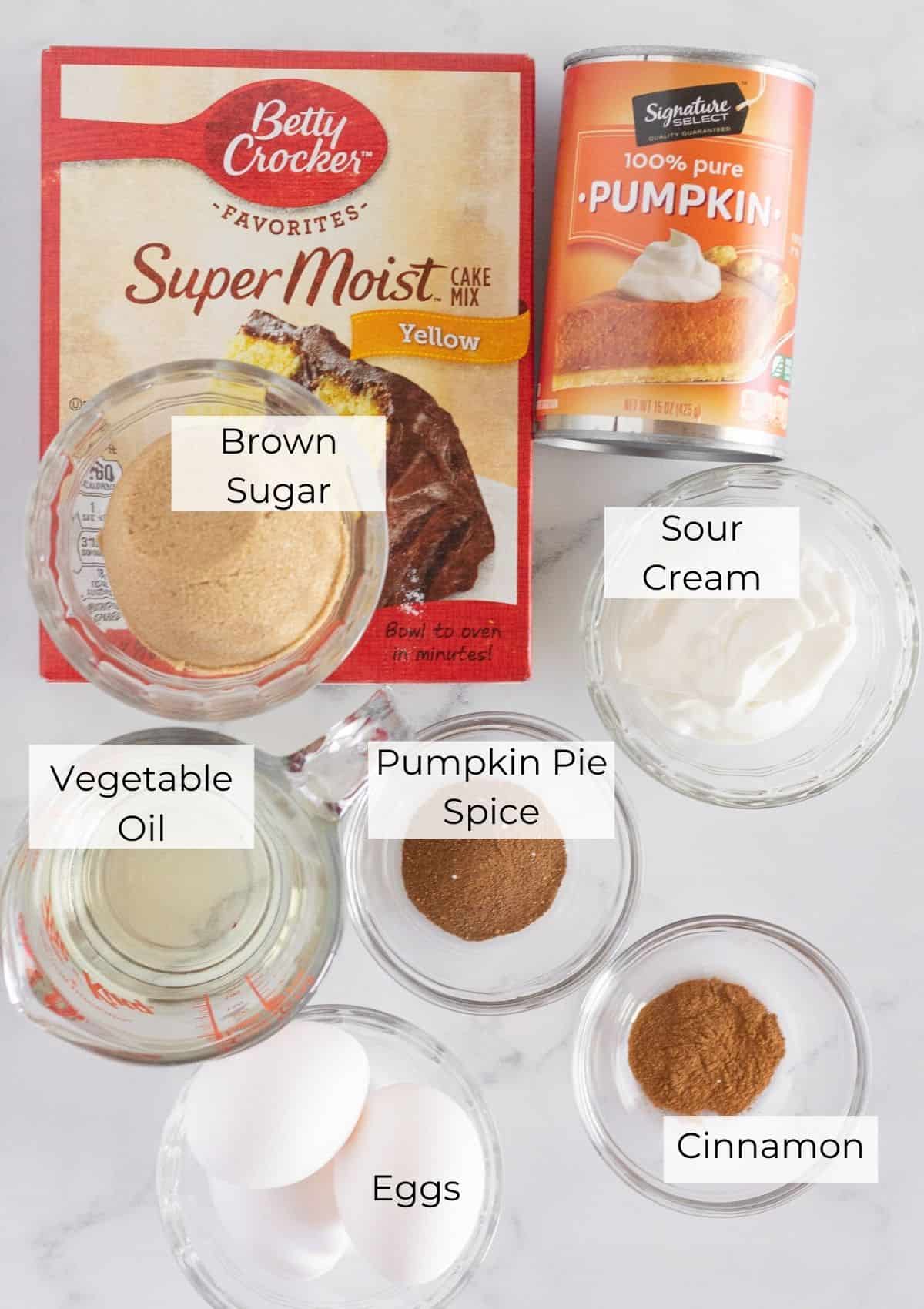 The ingredients needed to make pumpkin bread with a cake mix.