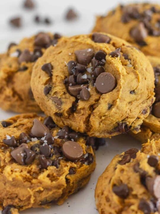 Pumpkin Chocolate Chip Cookies on a white plate.