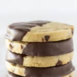 Chocolate chip shortbread cookies stacked on each other.