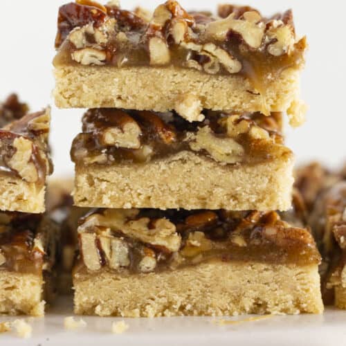 Pecan Shortbread bars stacked on each other.