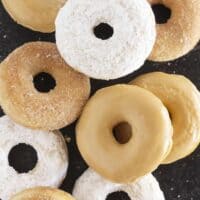 Pancake mix donuts with powdered sugar, cinnamon sugar and maple glaze.