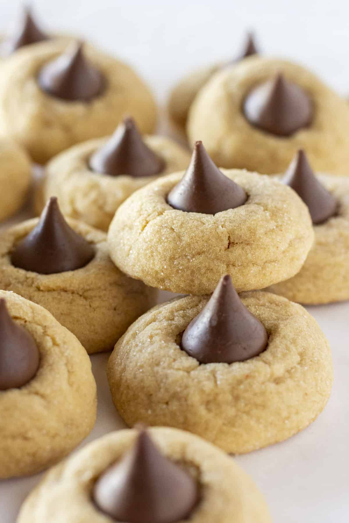 A tray of peanut butter blossom cookies made with a cake mix.