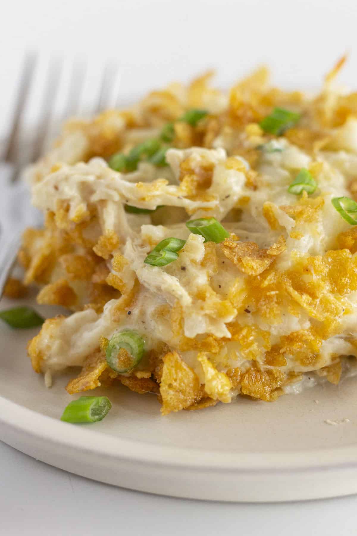 A serving of chicken and hashbrown casserole.