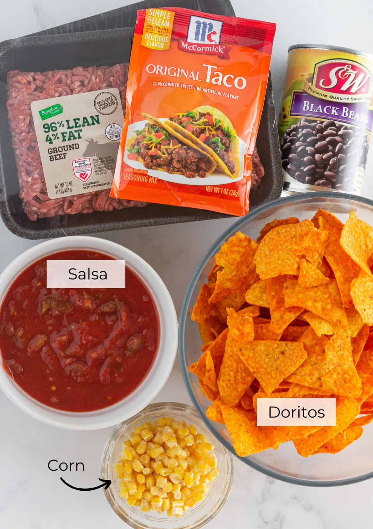 The ingredients needed to make Doritos Casserole with ground beef.
