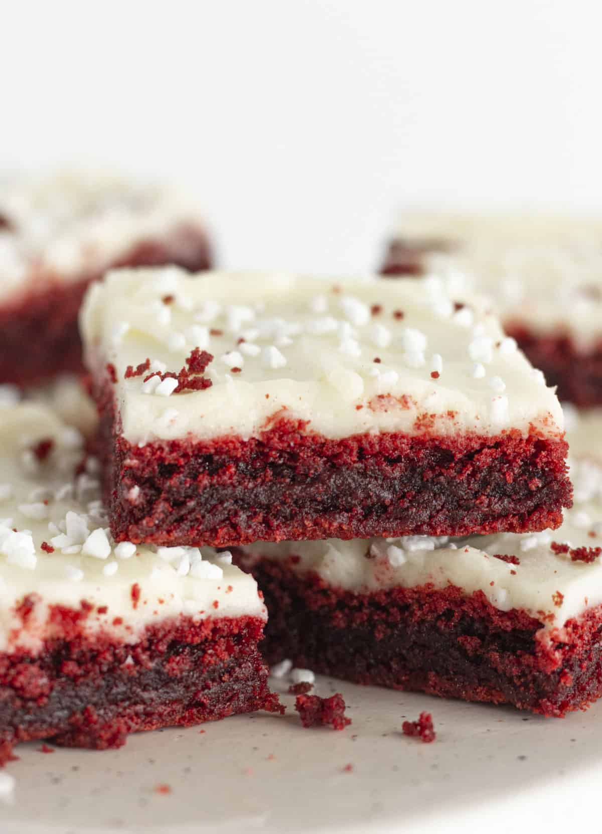 Finished red velvet brownies with cream cheese frosting.