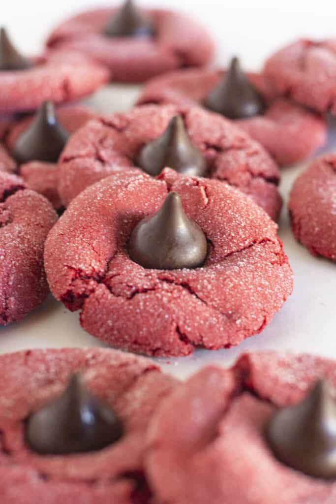 Red Velvet Kiss Cookies on a white tray.