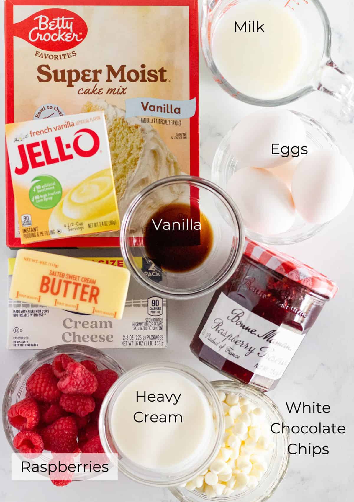 Ingredients needed to make a white chocolate raspberry cake.