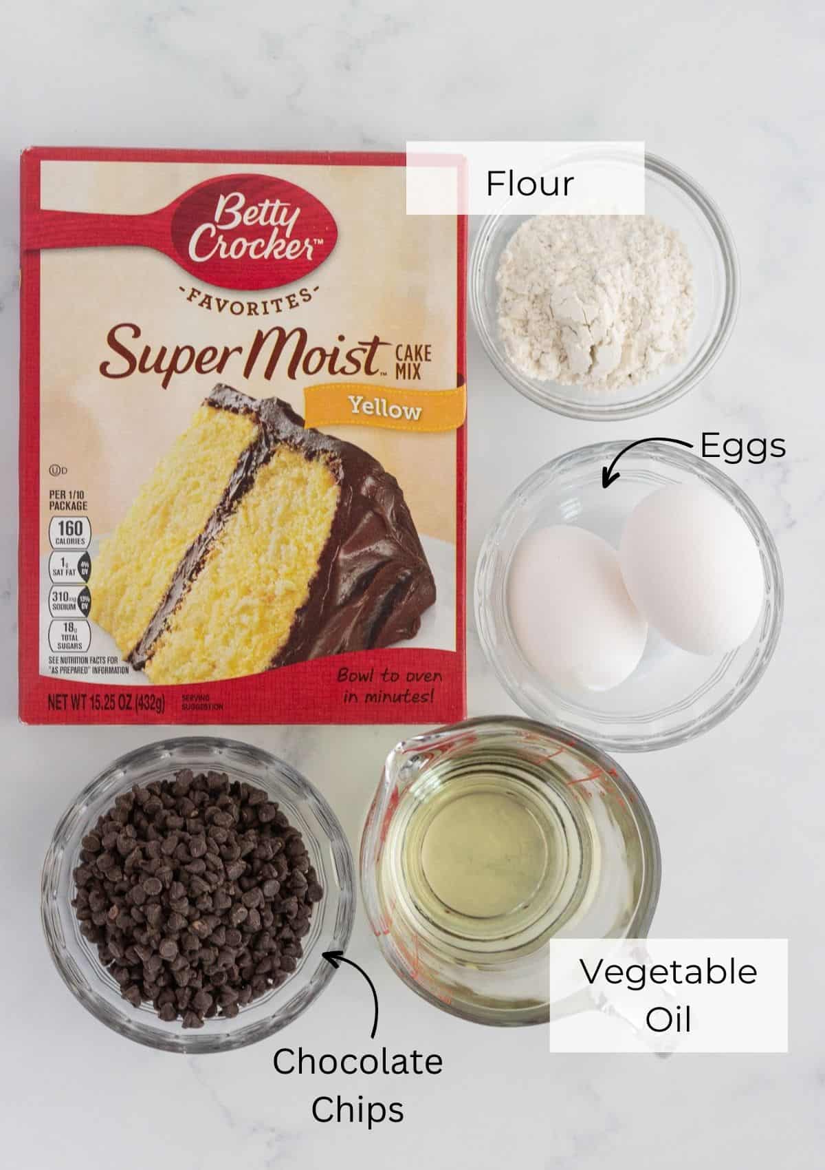The ingredients needed to make the chocolate chips cookie of brookies.