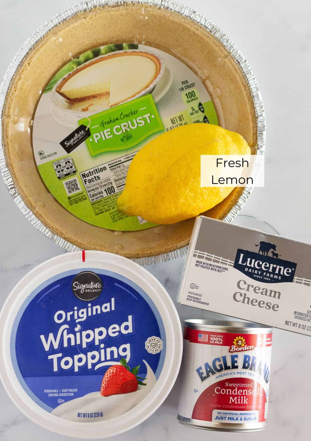 The ingredients needed to make a no bake lemon cheesecake.
