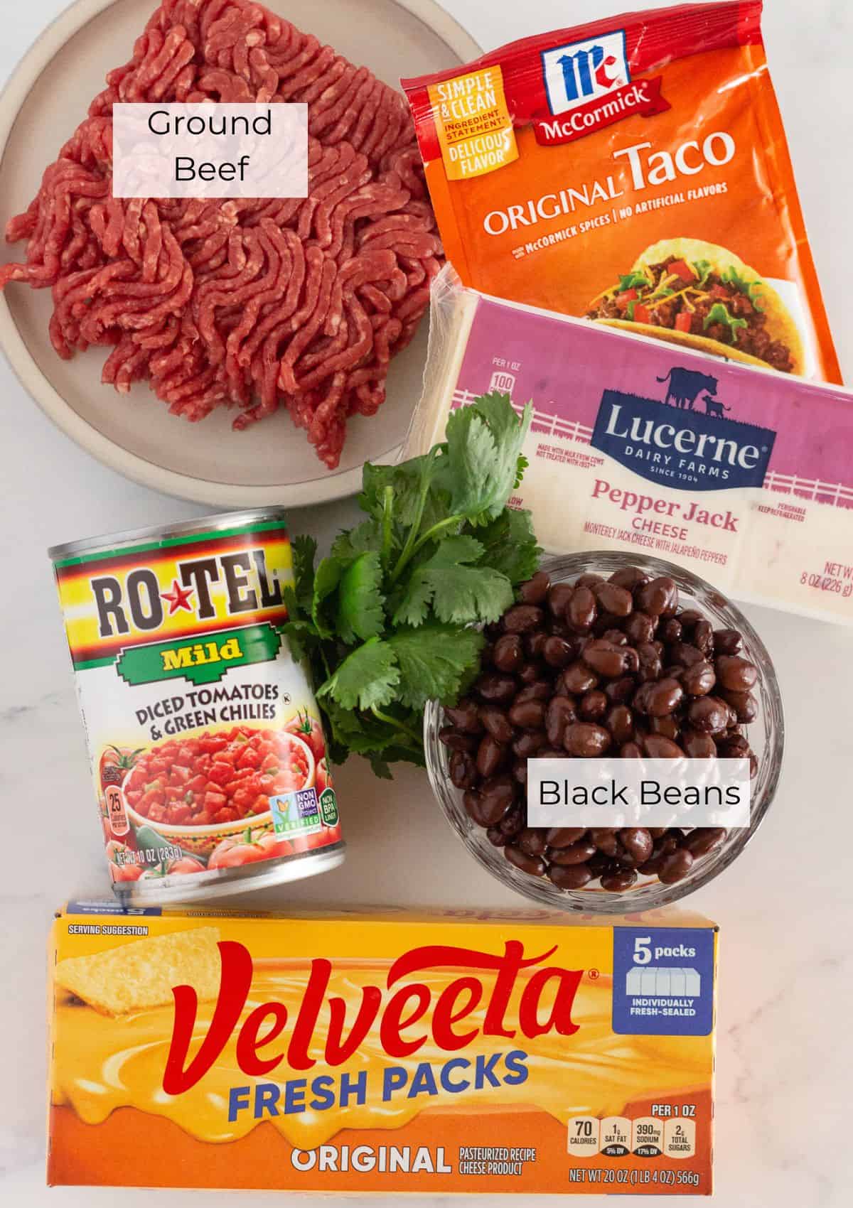 The ingredients needed to make Velveeta Queso with Rotel.