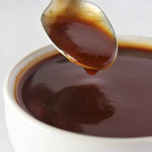 Whiskey glaze in a white bowl.