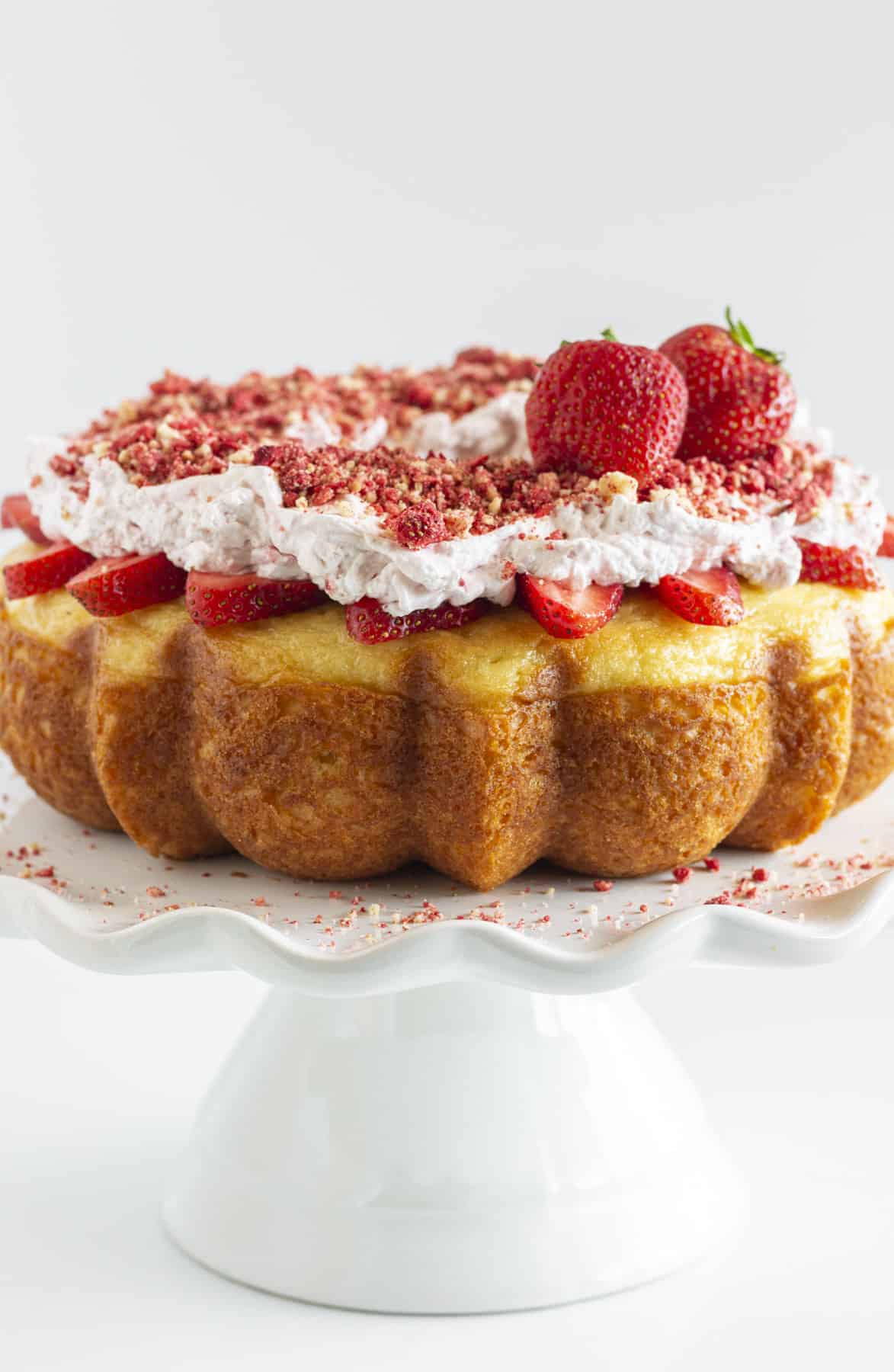 Strawberry Crunch Cake on a white tray.