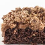 A slice of chocolate crunch cake on a plate.