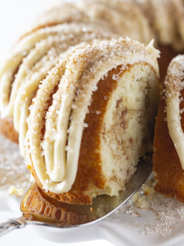 Serving a slice of Snickerdoodle Bundt Cake.
