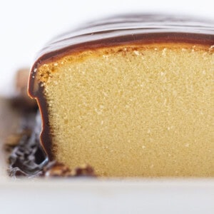 The inside of the Twix Pound Cake with layers of cake, caramel and chocolate.