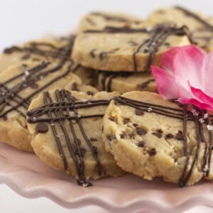 Hawaiian Shortbread Cookies on a pink cake plate.