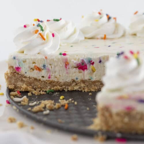 Looking inside funfetti no bake cheesecake.