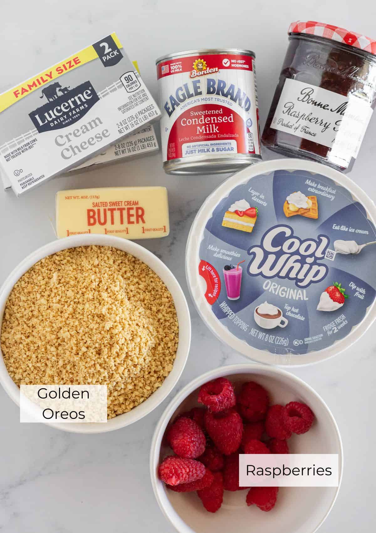 The ingredients needed to make a no bake raspberry cheesecake.