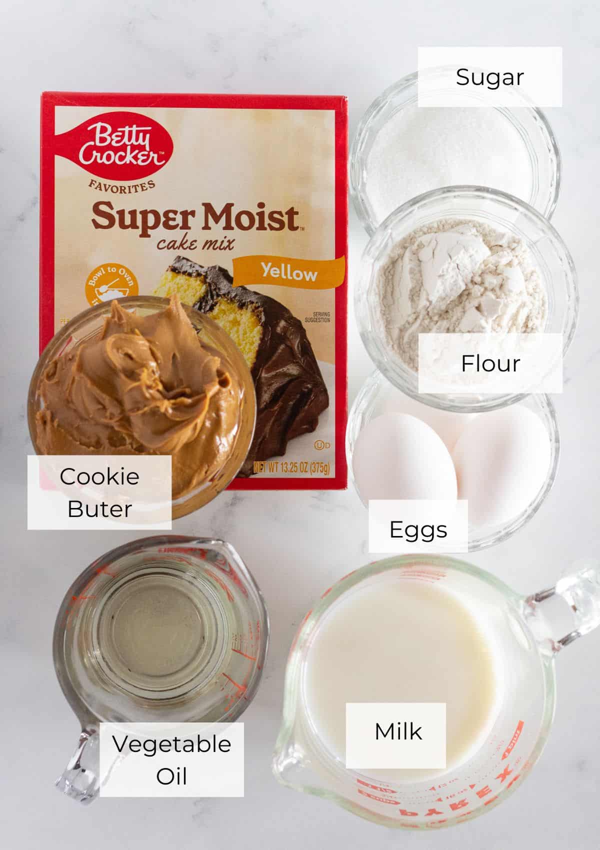 The ingredients needed to make Biscoff Cookie Butter Cupcakes.