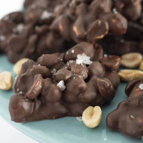 3 ingredient chocolate covered peanuts on a cake plate.