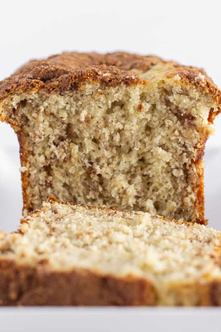 A loaf of cake mix banana bread with a cinnamon swirl baked inside.