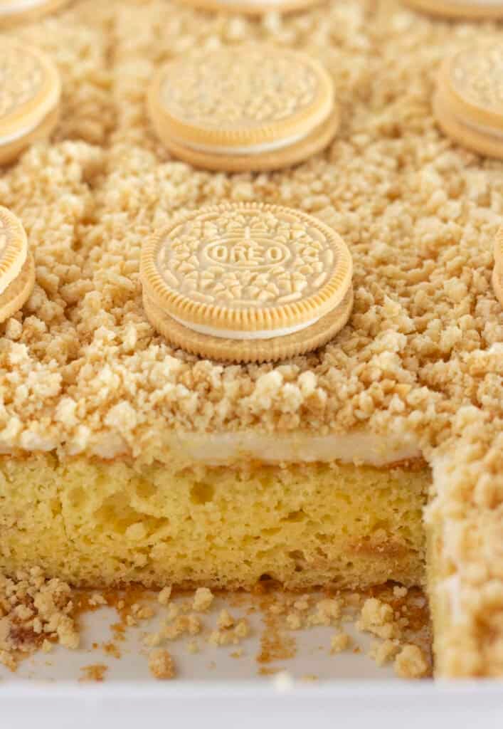 Golden Oreo Cake with cookies baked inside and topped with them.