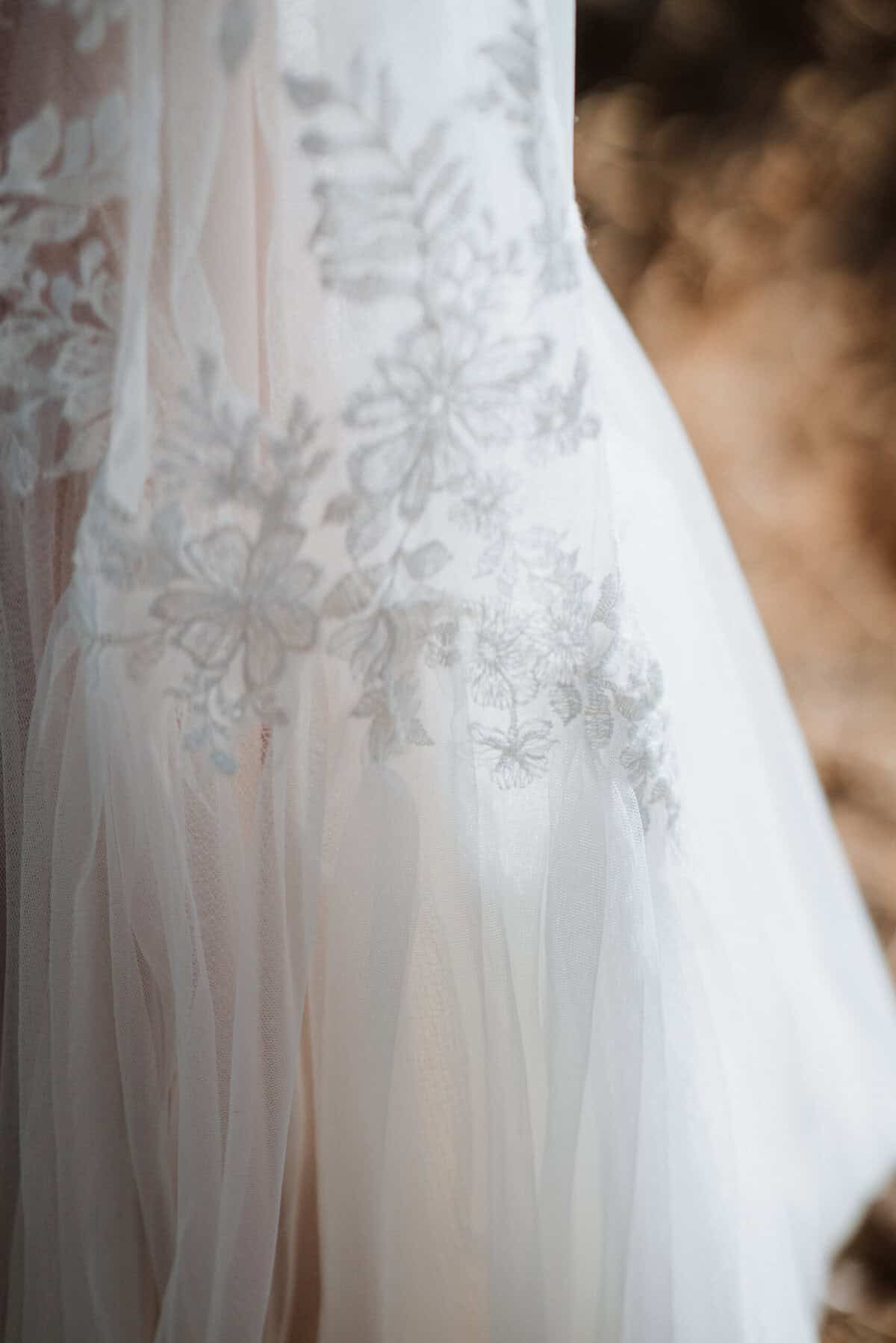 A closeup of the wedding dress.