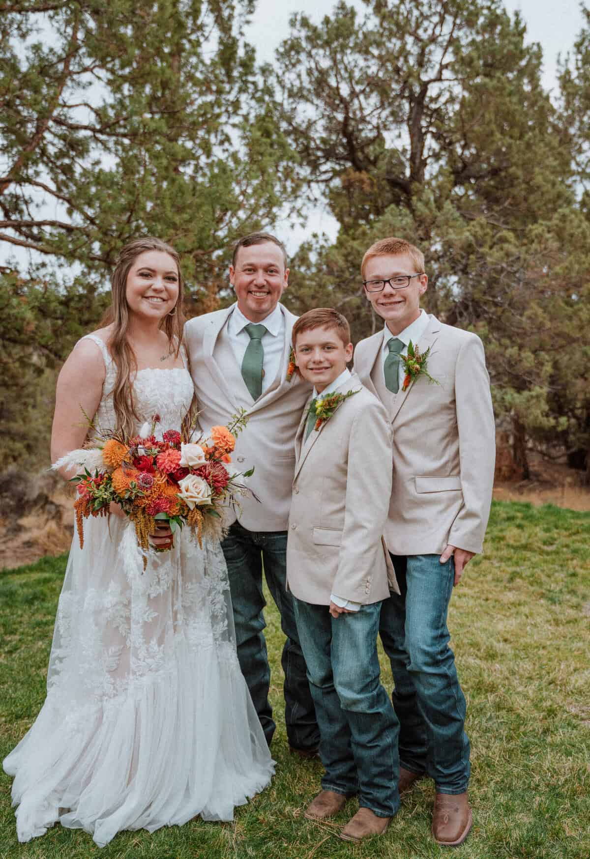 Bride and groom with their sons.