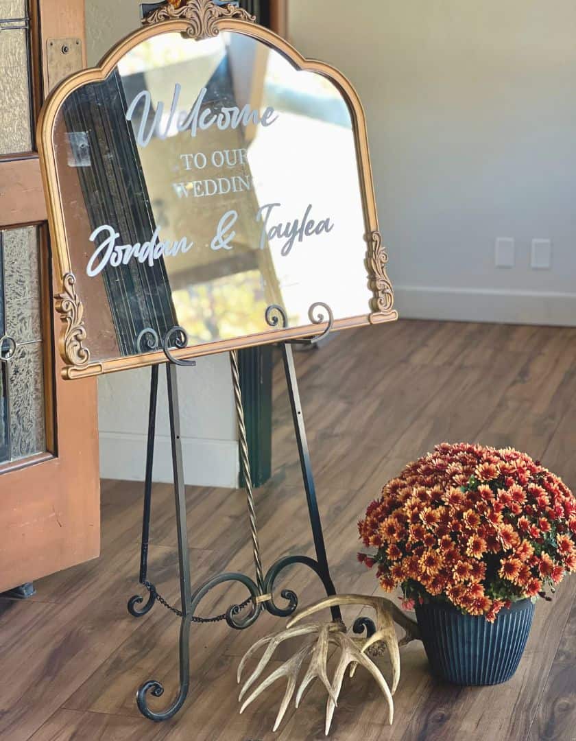 Welcome mirror at wedding.
