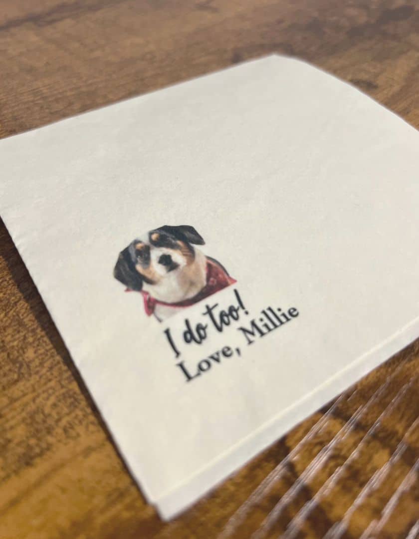 Napkins that were personalized with their dog on them.
