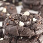 Stacks of chocolate cookies and cream cookies.