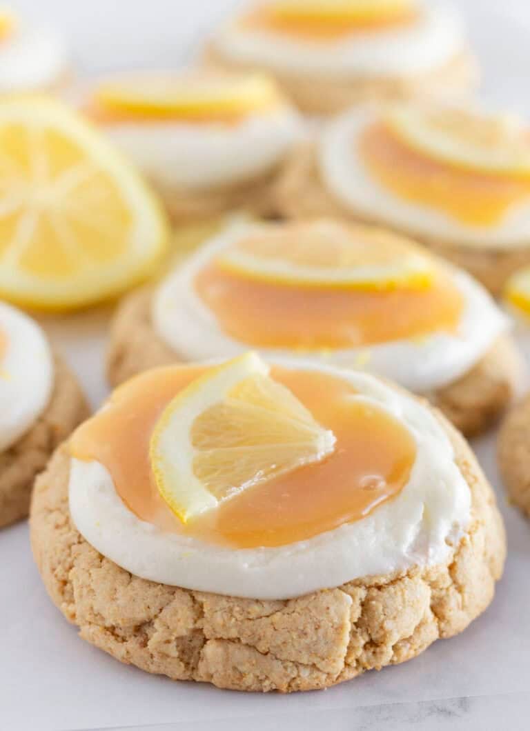 Lemon cheesecake cookies on a tray for serving.