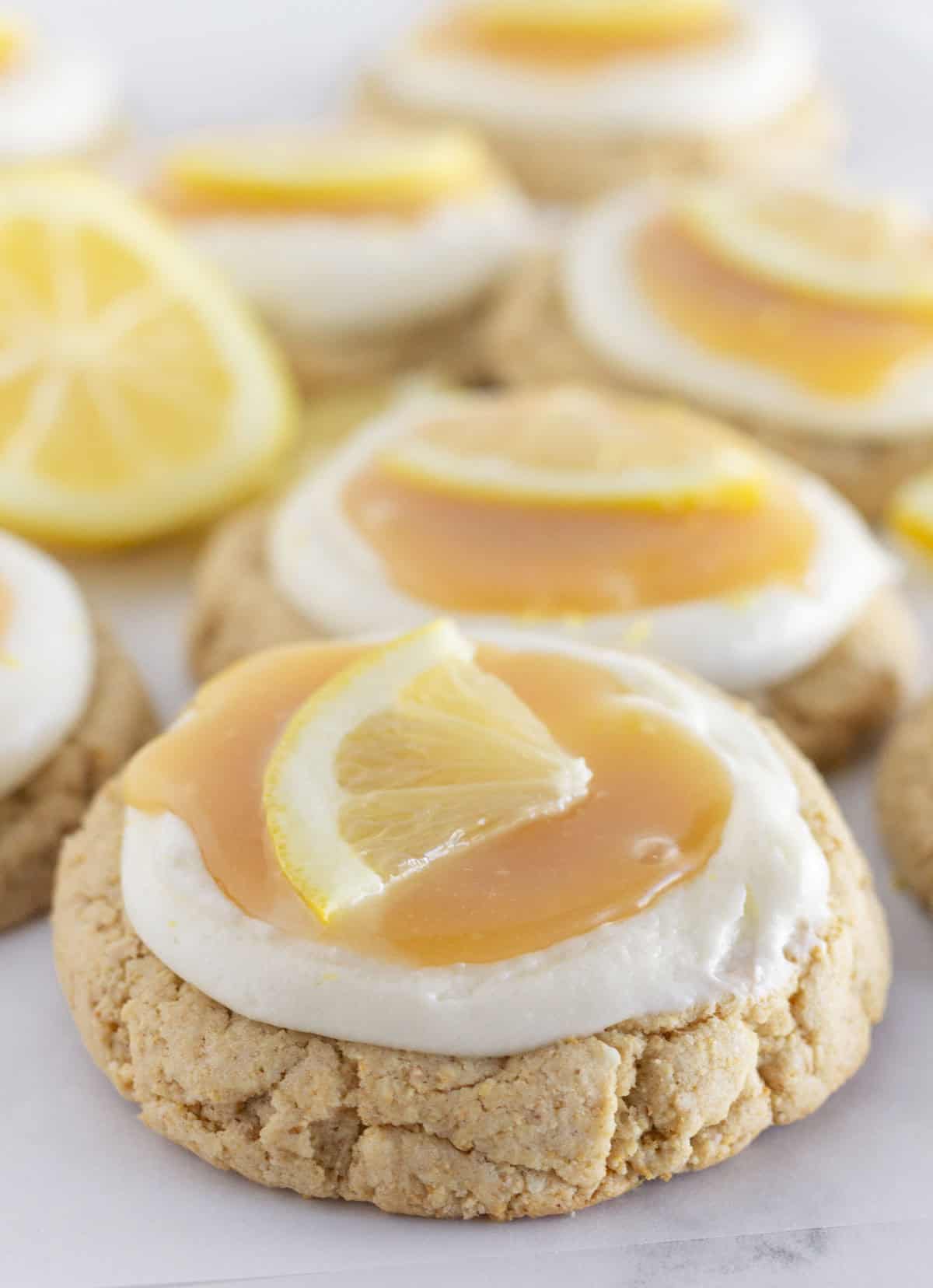 Lemon cheesecake cookies on a tray for serving.