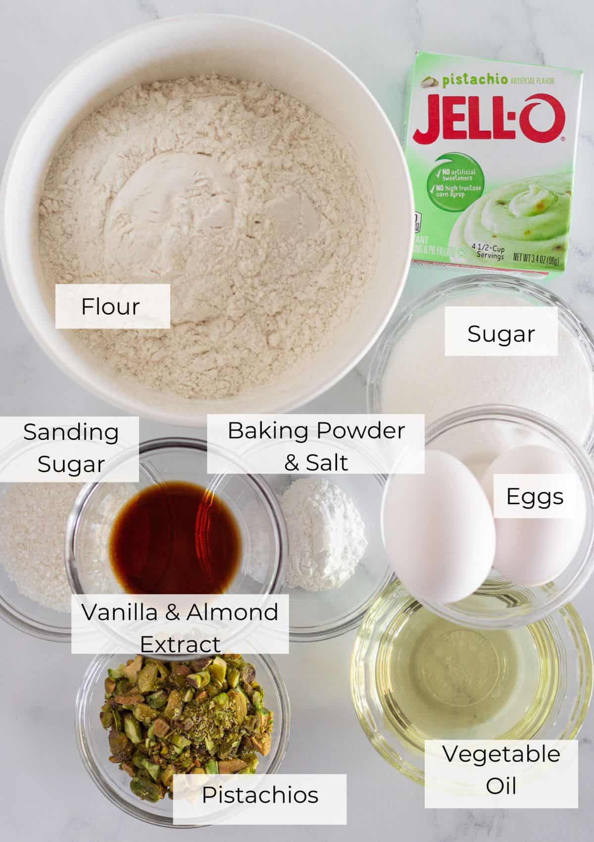 The ingredients needed to make pistachio muffins with instant pistachio pudding.