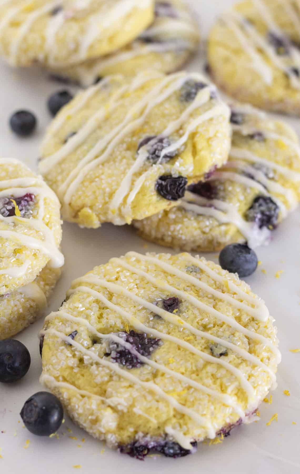 Lemon blueberry cake mix cookies with lemon glaze.