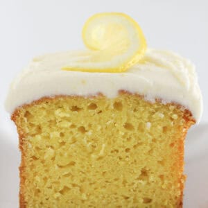 A loaf of lemon bread with frosting on top.