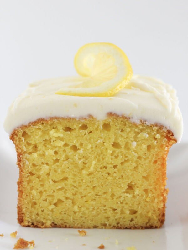 A loaf of lemon bread with frosting on top.