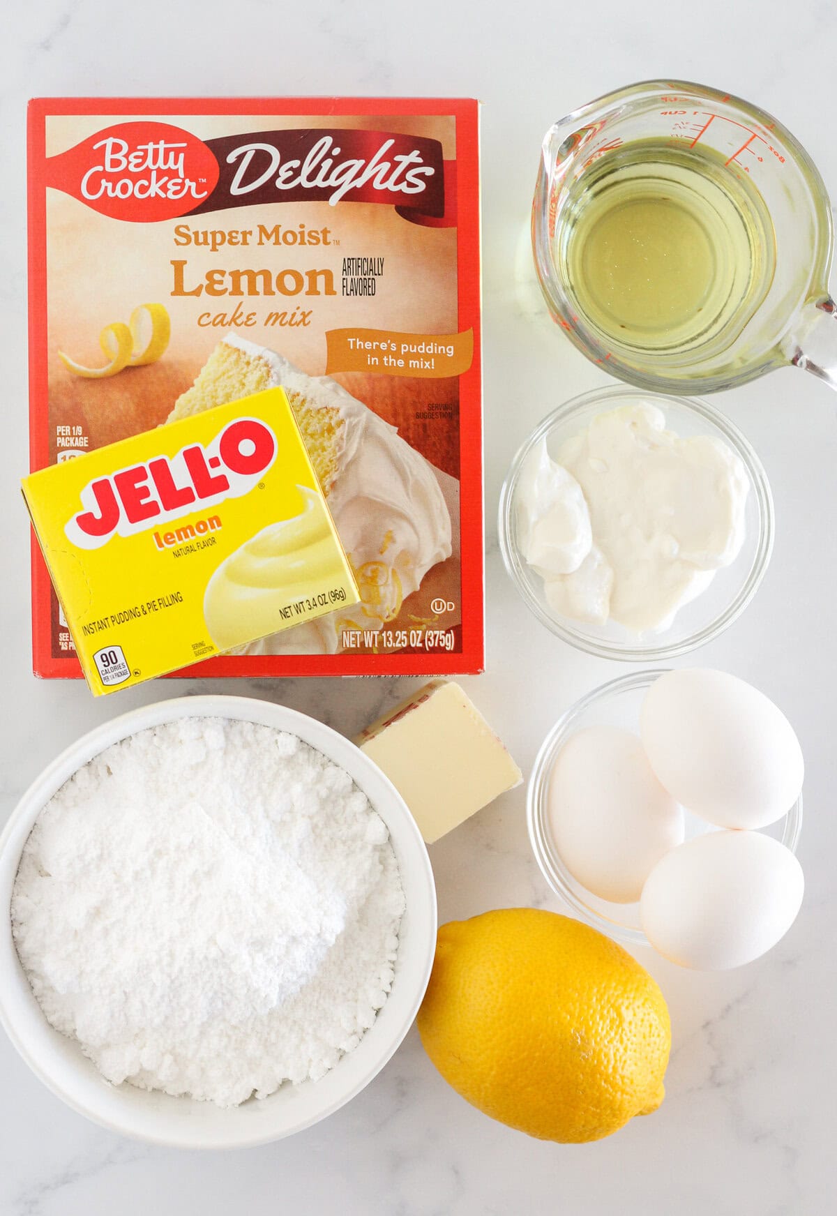 The ingredients needed to make lemon loaf.