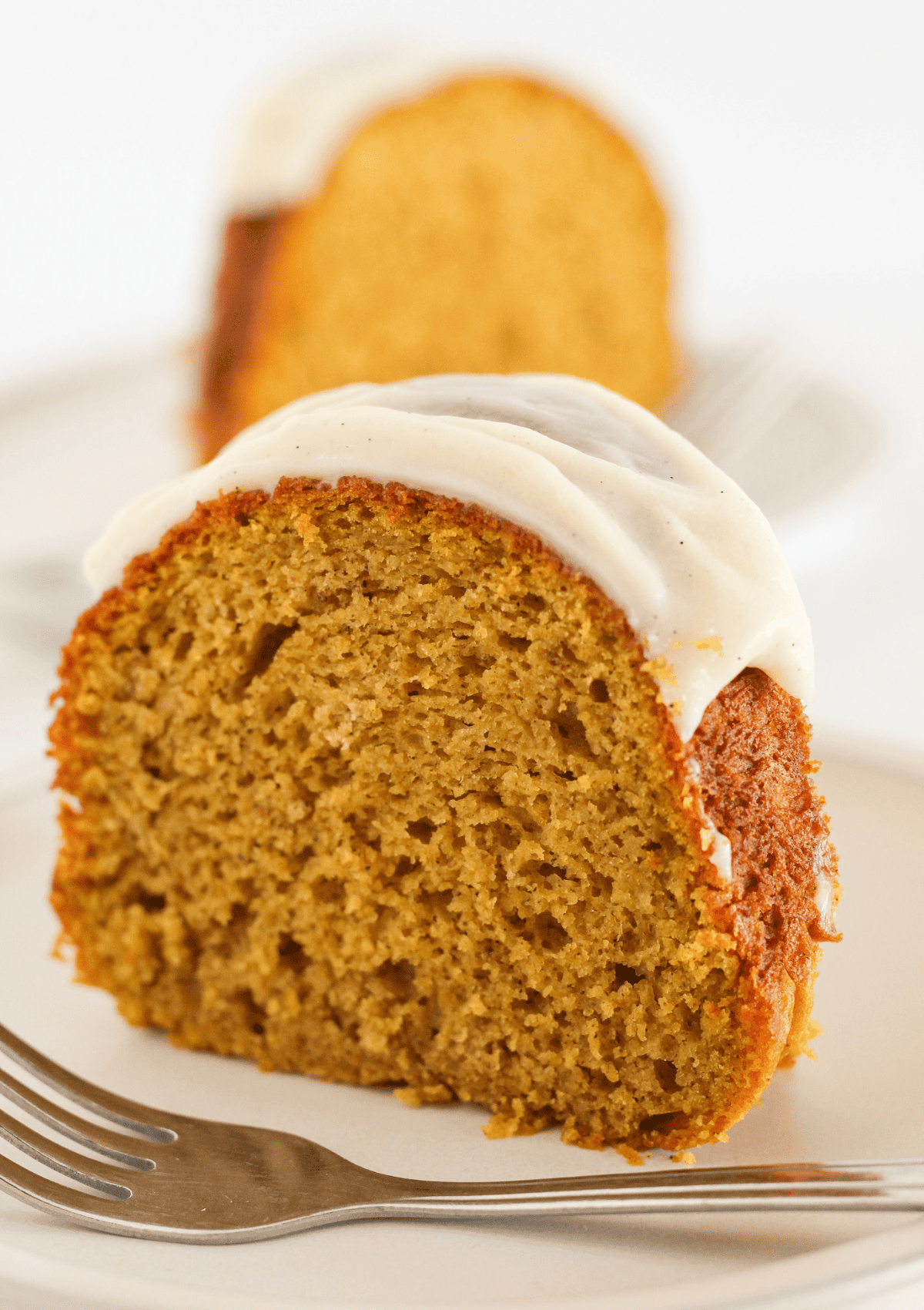 Two slices of pumpkin pound cake.