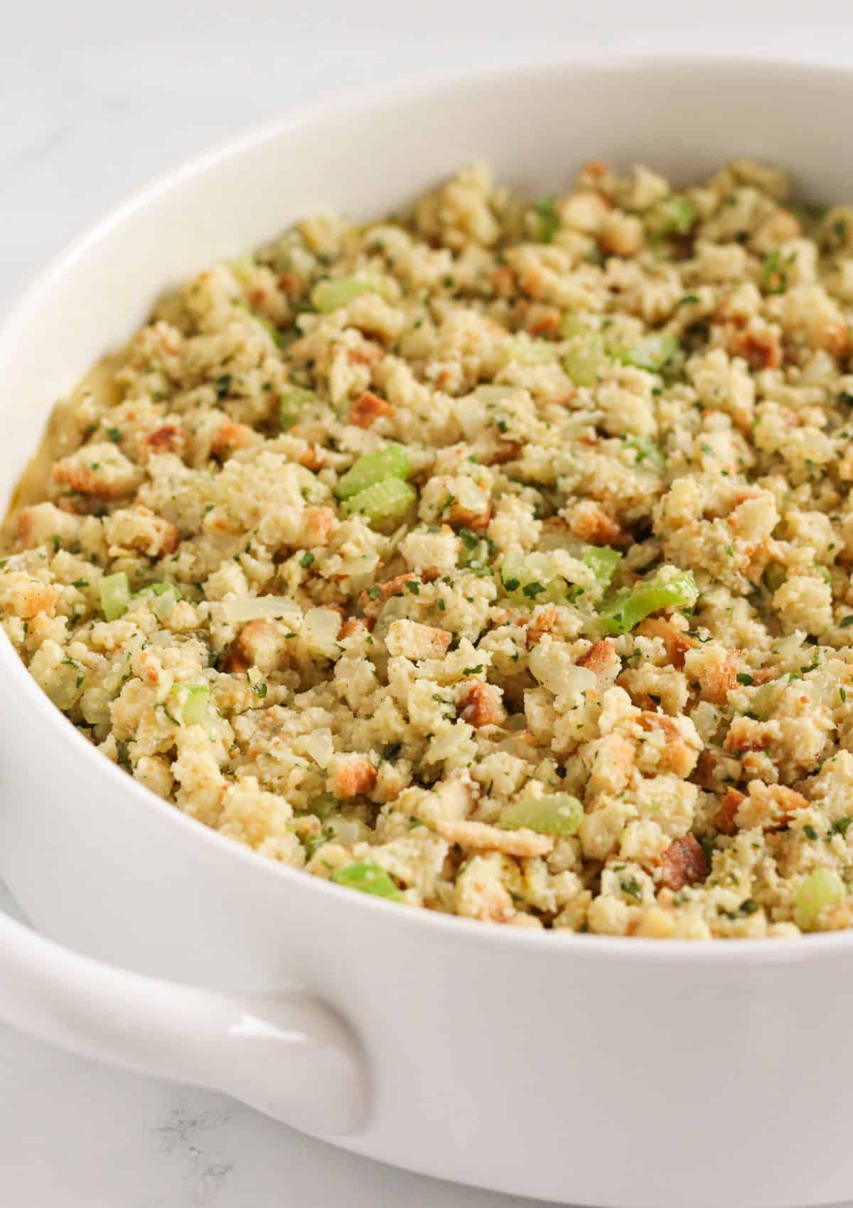 Top chicken with stuffing mixture and bake.