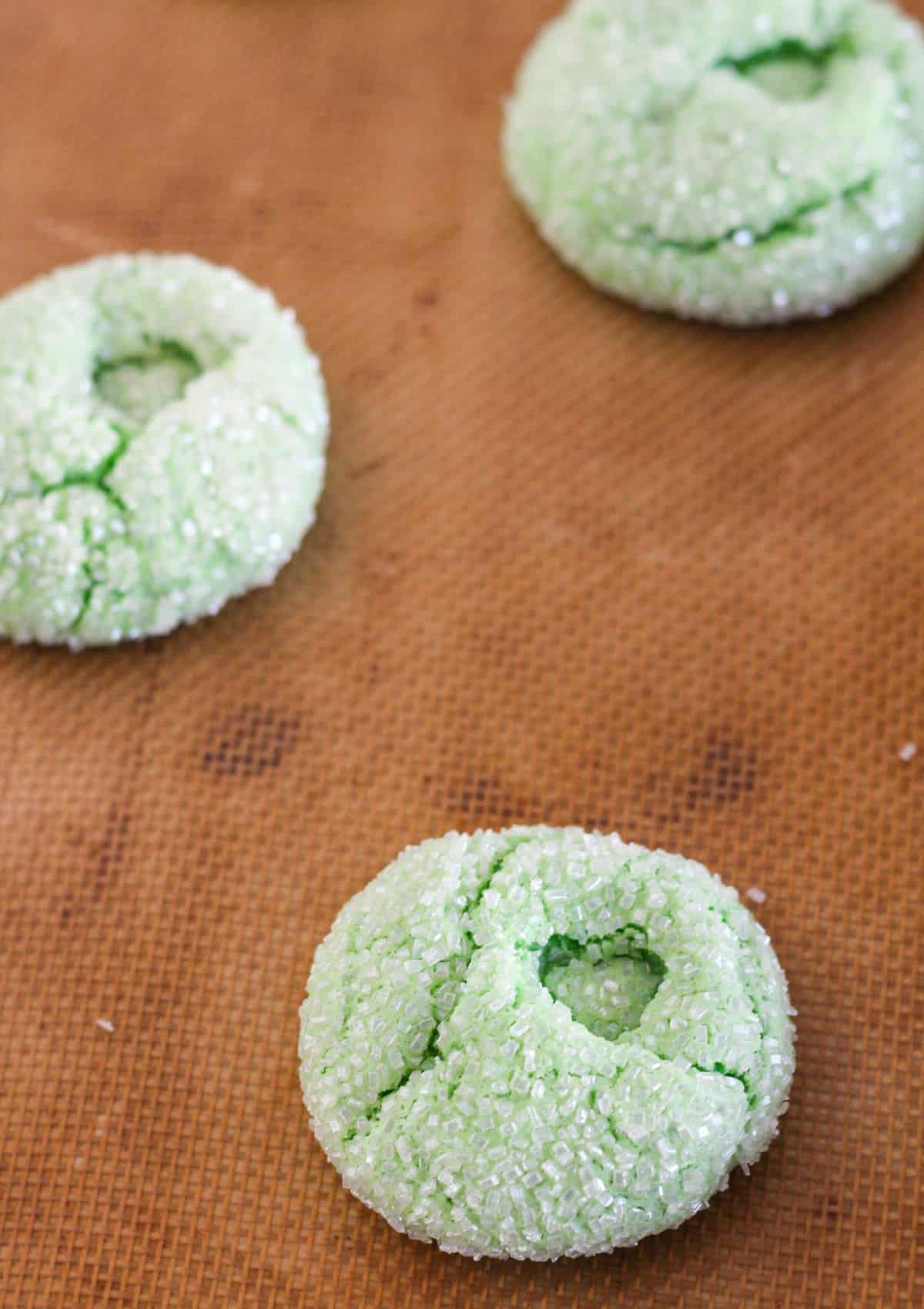 Making the heart indentation in each cookie.
