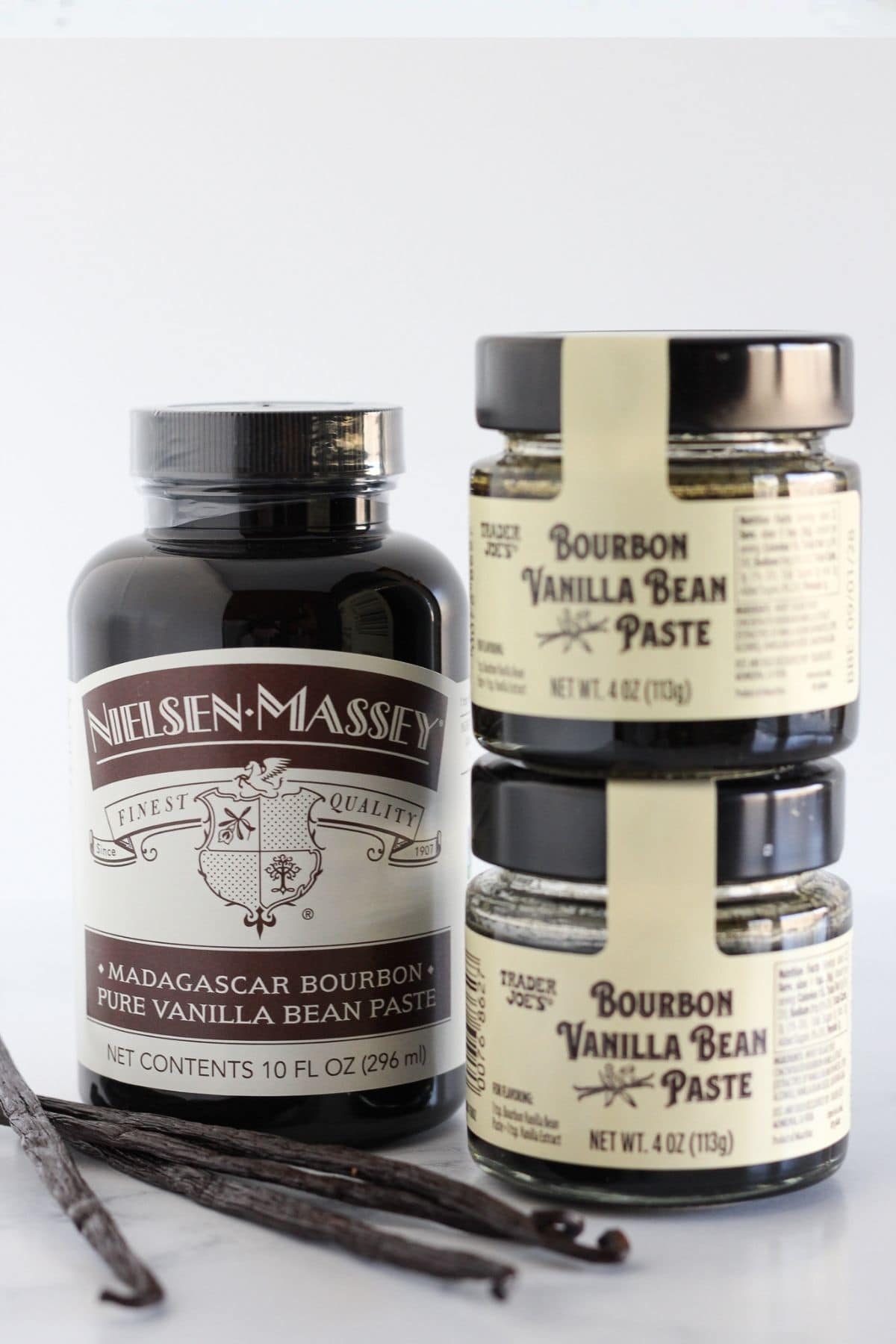 Vanilla bean paste in packages with vanilla bean pods.