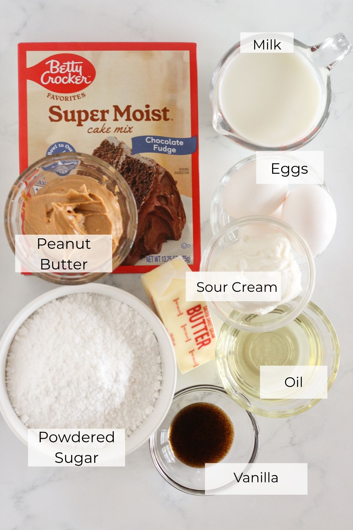 The ingredients needed to make chocolate peanut butter cake.