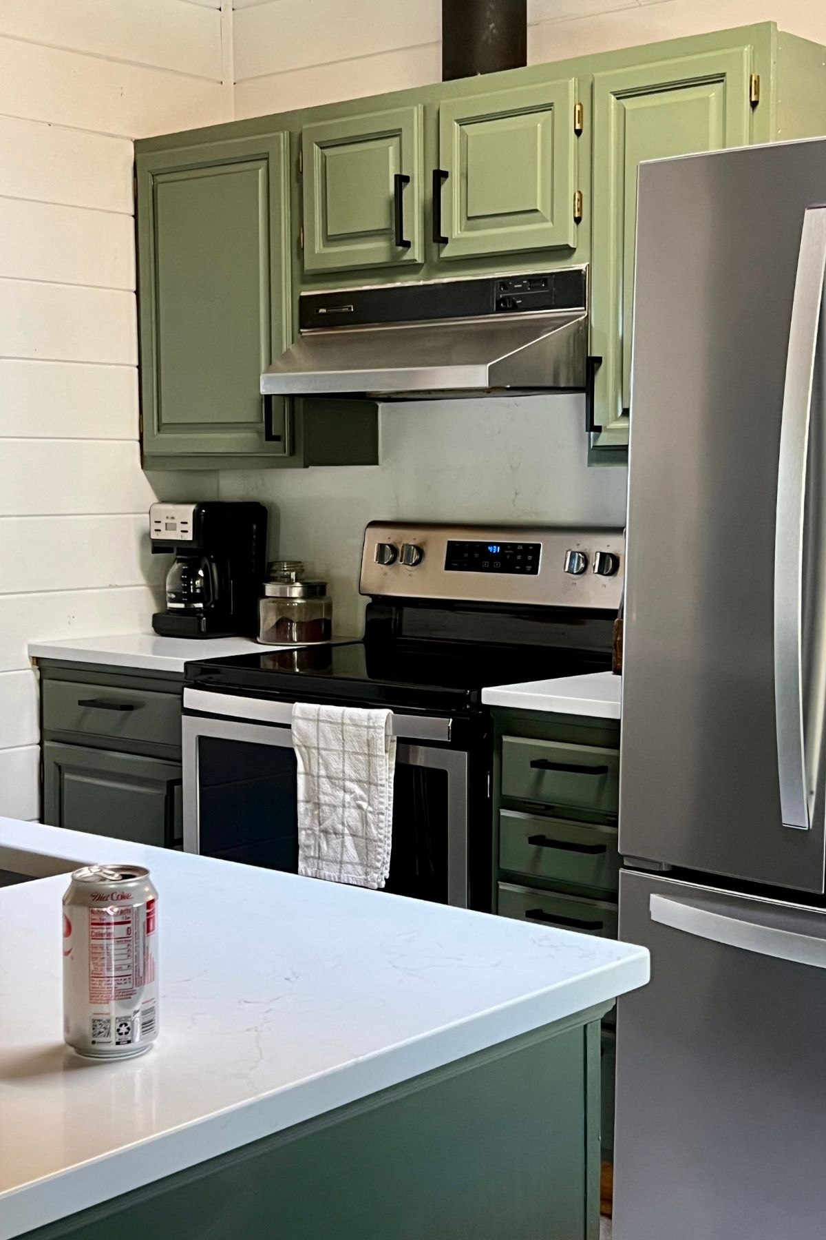 The stove and cupboards in remodeled kitchen.