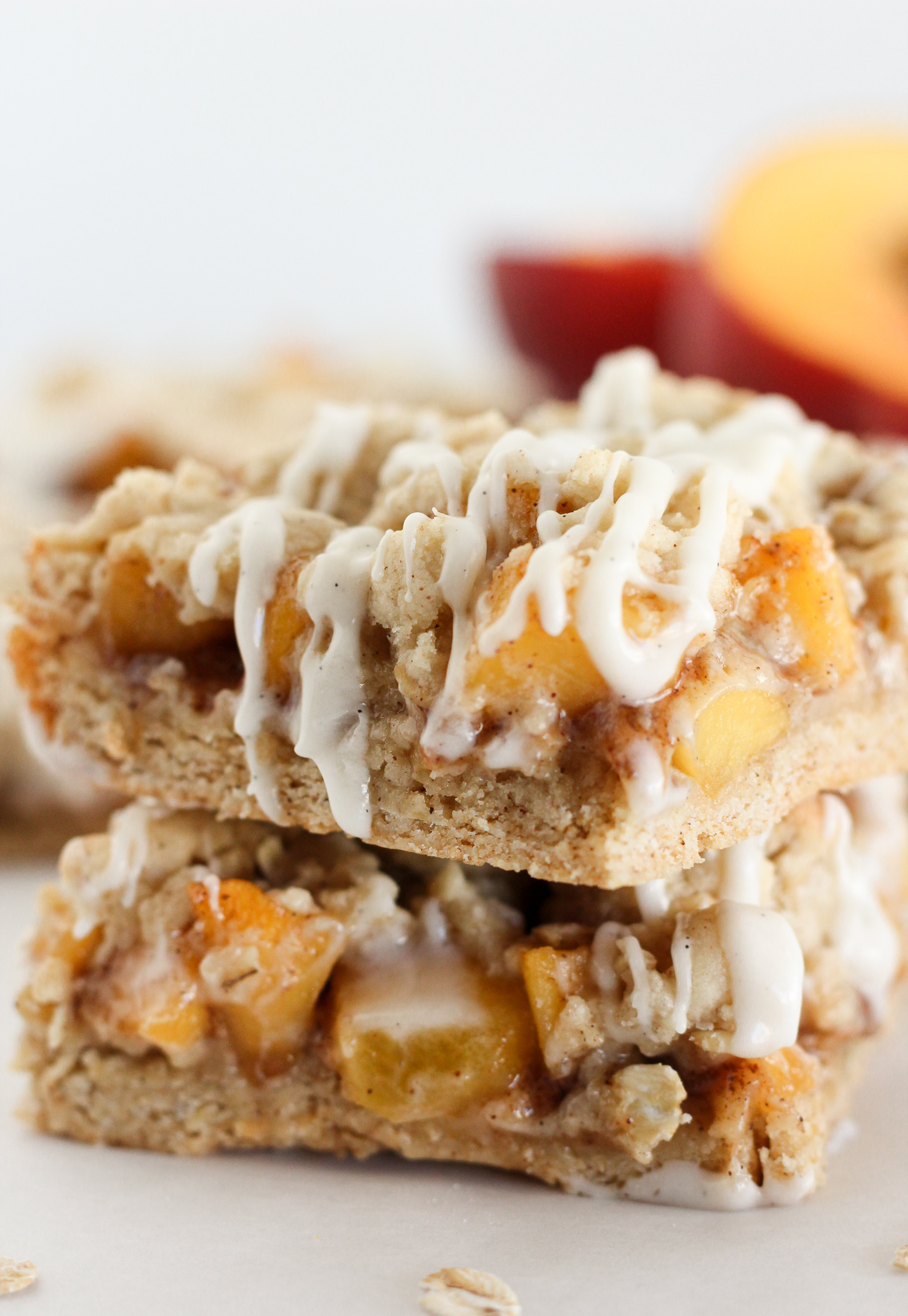 Peach crisp cookie bars stacked on each other.